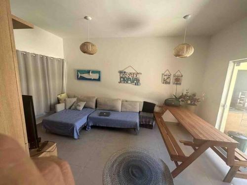 Χώρος καθιστικού στο Casa em condomínio fechado em santiago maresias a 100 metros da praia