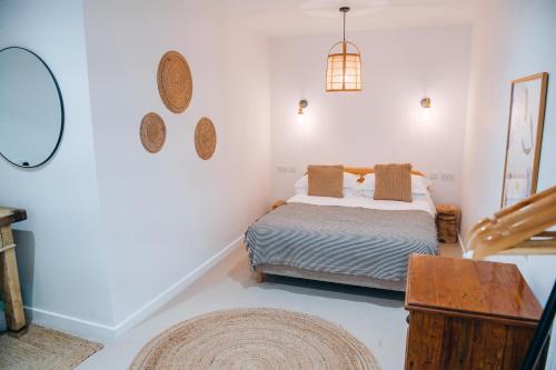 a bedroom with a bed in a room at Primrose House St. Ives in St Ives