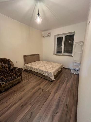 Postel nebo postele na pokoji v ubytování Sargsyan Guest House