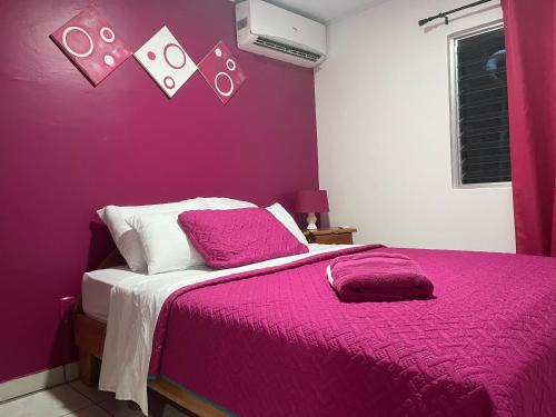 Postel nebo postele na pokoji v ubytování Villas Majolana