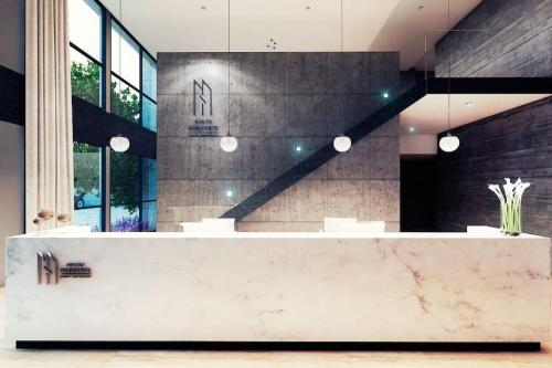 a lobby with a marble counter in a room at Departamento en Punto Horizonte, Sonata Puebla in Lomas de Angelopolis