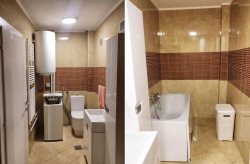 łazienka z 2 toaletami, umywalką i wanną w obiekcie Amazing View City Square Apartment w mieście Skopje