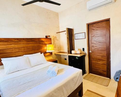Ένα ή περισσότερα κρεβάτια σε δωμάτιο στο Casa Hamaca Nayarit