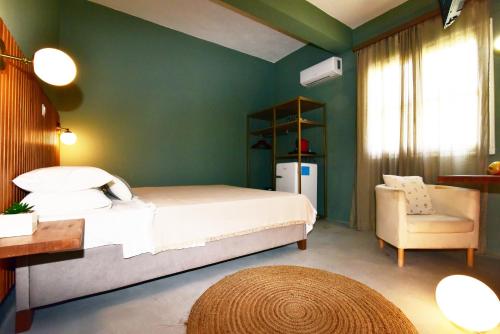Кровать или кровати в номере Lord Ape Suites Club