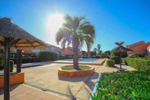 Vonkajšia záhrada v ubytovaní Le Sénérité Piscine Proche Plage Palavas Parking