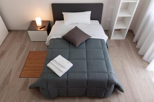 Voodi või voodid majutusasutuse Novatek Apartment B&B toas