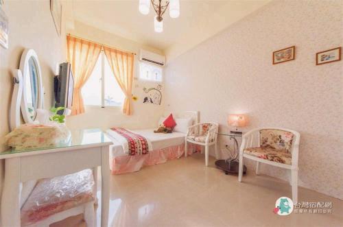Cama o camas de una habitación en 巧緣民宿11人包棟