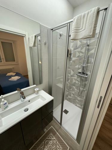 a bathroom with a shower and a sink at Giagi B&B in Trento