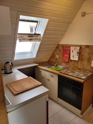 Kuchyň nebo kuchyňský kout v ubytování Zentrale Dachwohnung in SHA