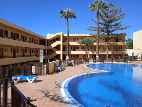Πισίνα στο ή κοντά στο Firstline apartment Los Cristianos