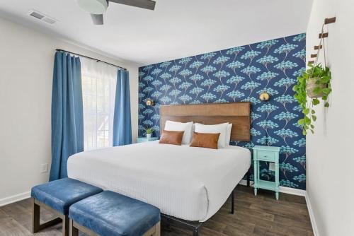 Ένα ή περισσότερα κρεβάτια σε δωμάτιο στο WeCo Duplex -8 BR- Sleeps 16