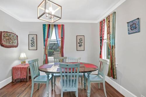 a dining room with a table and chairs at Unique 3BR - Sleeps 6 in Columbia