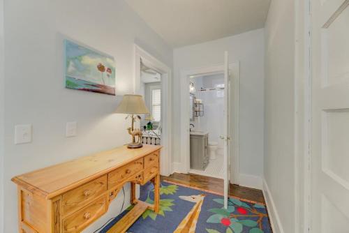 a home office with a wooden desk and a bathroom at Peaceful 3BR in DT Columbia in Columbia
