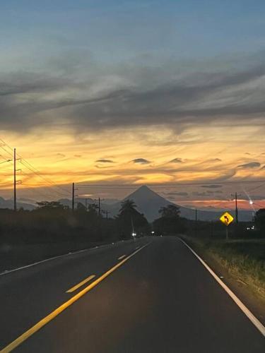 a view of a road with a mountain in the distance at Trailer House in Vara Blanca