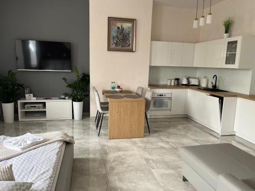 Η κουζίνα ή μικρή κουζίνα στο Apartamenty AP 13