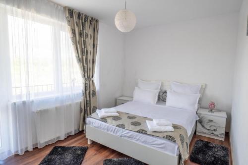 Ένα ή περισσότερα κρεβάτια σε δωμάτιο στο Apartament Citadel