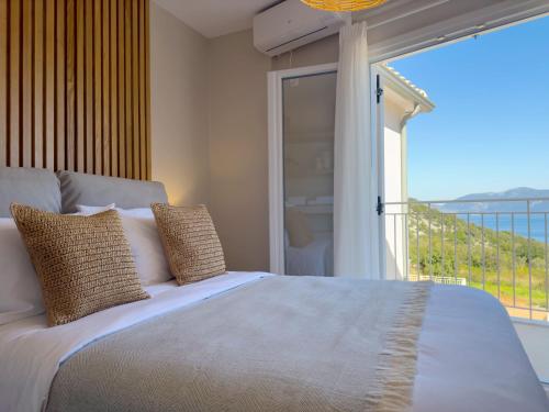 Postel nebo postele na pokoji v ubytování Paradise Villas