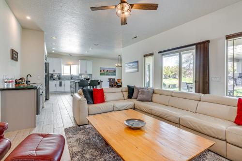 a living room with a couch and a table at Spacious Mesquite Getaway - half Mi to Golf Course in Mesquite