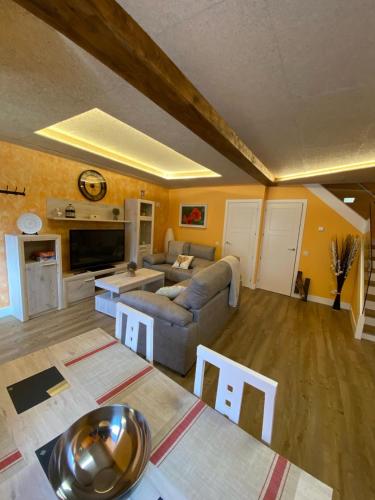a living room with a couch and a table at Casa Dakar in Valdemaluque