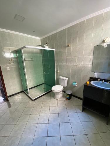 Ein Badezimmer in der Unterkunft Pousada Queiroz