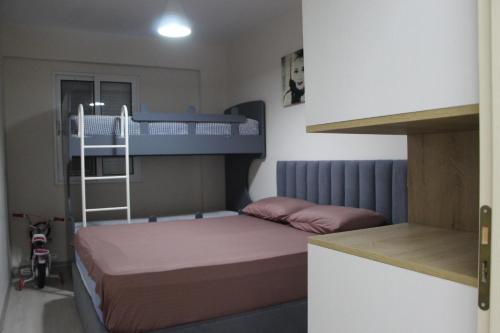 Una cama o camas en una habitación de Sirel Home