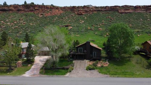 a small house on the side of a hill at The Horsetooth Stoop - Biking, Boating & Sunsets in Fort Collins