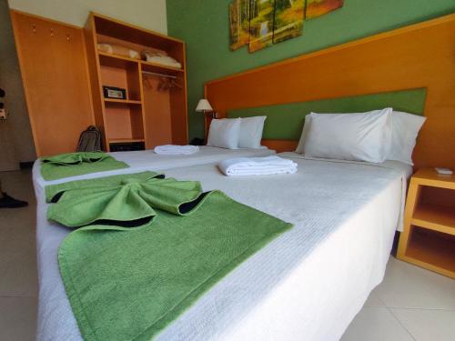 Postel nebo postele na pokoji v ubytování Hotel Belvedere Mindelo, Cabo Verde