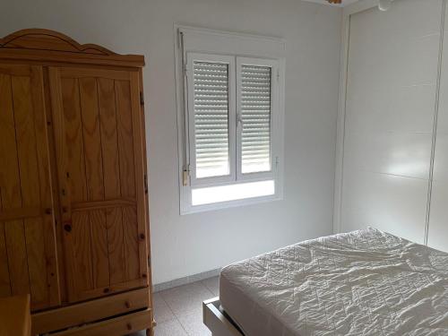 Postel nebo postele na pokoji v ubytování Casa Romanilla