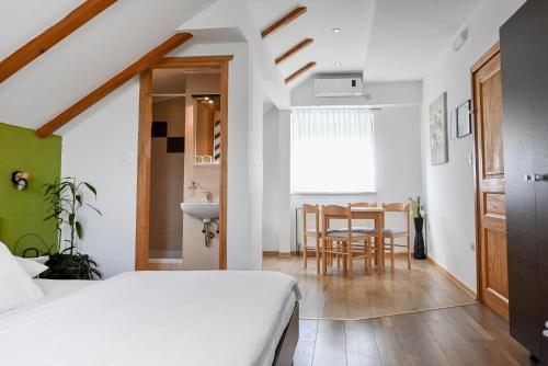 Ένα ή περισσότερα κρεβάτια σε δωμάτιο στο Guesthouse Rubcic