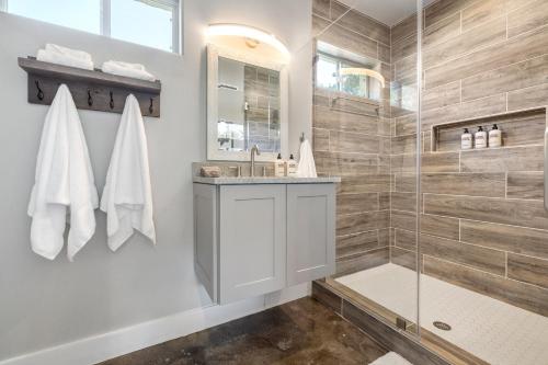 a bathroom with a sink and a shower at New Casita in Deer Creek Area in Dripping Springs