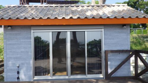a small house with an orange roof at LaVilla - Vacation STAY 27367v in Nobotate