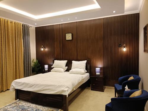 Łóżko lub łóżka w pokoju w obiekcie Royal Resort