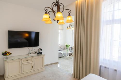 TV a/nebo společenská místnost v ubytování COLUMBUS Apartamenty Ustka - Marynarki Polskiej 2