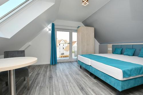 Katil atau katil-katil dalam bilik di City-Hotel Zuffenhausen - Apartments