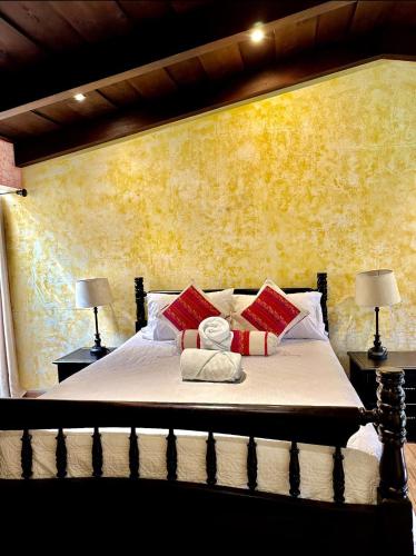 Ένα ή περισσότερα κρεβάτια σε δωμάτιο στο Casa Mia Hotel