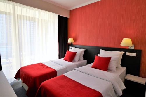 East Gate Boutique Hotelにあるベッド