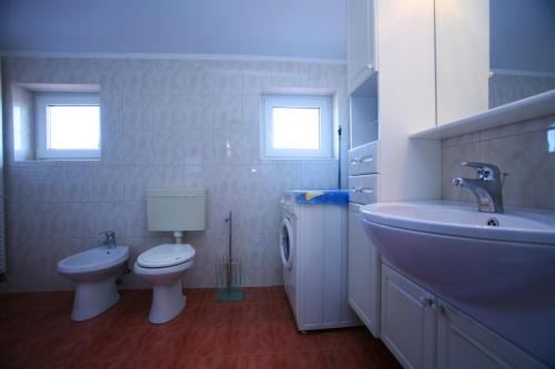Kúpeľňa v ubytovaní Apartments Villa Oliva