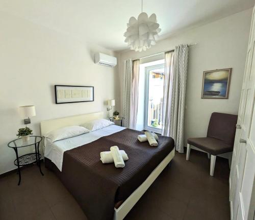 Posteľ alebo postele v izbe v ubytovaní Mare del Sud , Lovely apartment with sea view