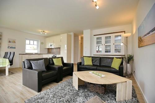 Posezení v ubytování Schönes Ferienhaus in Boltenhagen mit Terrasse, Grill und Garten