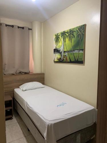 Hotel Pousada dos Anjosにあるベッド