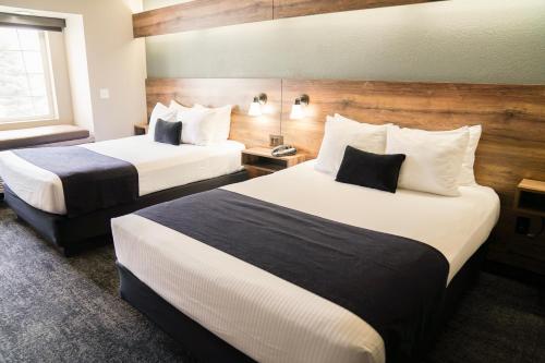 Hotel Ruby Sandpointにあるベッド