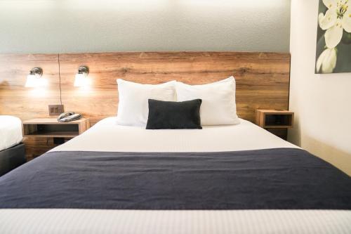 Hotel Ruby Sandpointにあるベッド