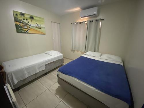 Hotel Pousada dos Anjosにあるベッド
