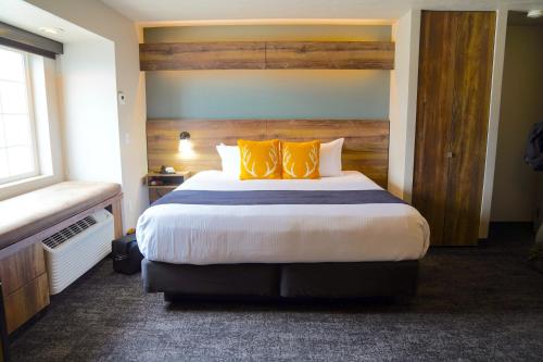 Hotel Ruby Sandpointにあるベッド