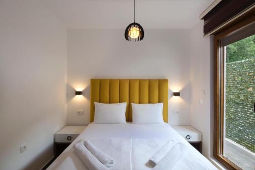 Una cama o camas en una habitación de Villa Lazy Hill