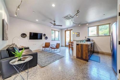 a living room with a couch and a table at LaFave Luxury Rentals at Zion in Springdale