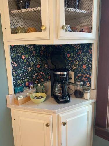 a kitchen counter with a blender on top of it at Firefly Hills in Beattyville