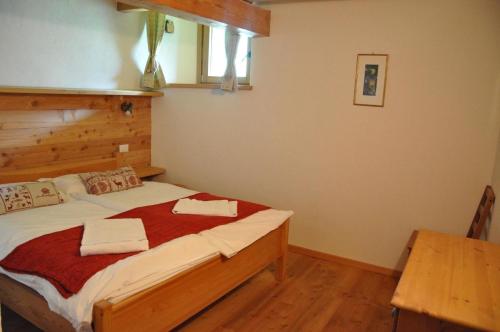 Cama o camas de una habitación en Ferienwohnung für 4 Personen ca 70 qm in Gignod, Aostatal Grand Paradis