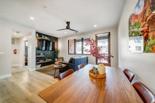 a dining room and living room with a table and chairs at LaFave Luxury Rentals at Zion in Springdale