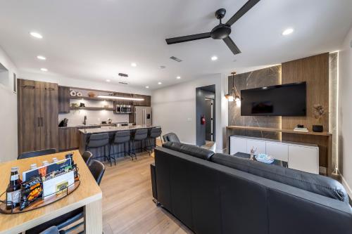 a living room with a couch and a bar at LaFave Luxury Rentals at Zion in Springdale